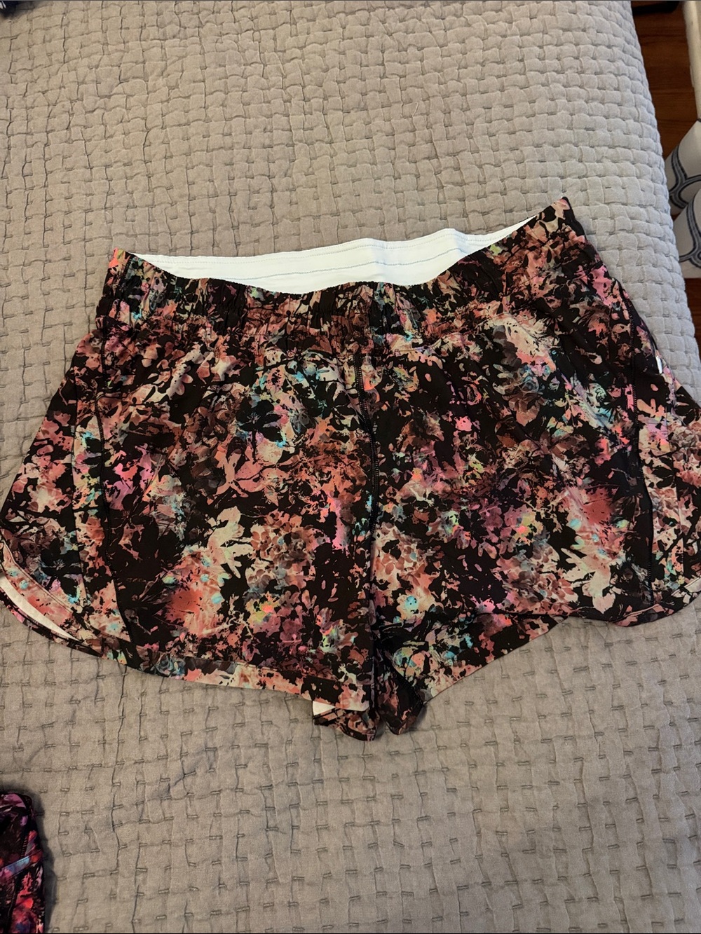 lululemon athletica Black Floral Splash Athletic Shorts with Pink & Teal Accents